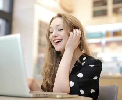 Woman working at a desk.