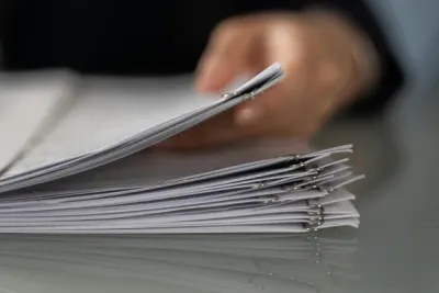 A man reading documents.